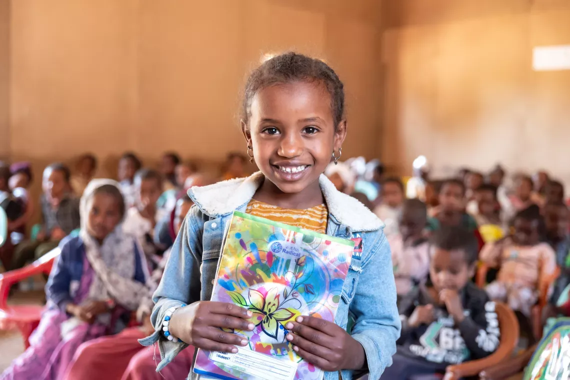 Students and community members participating in a Chelia Charity program