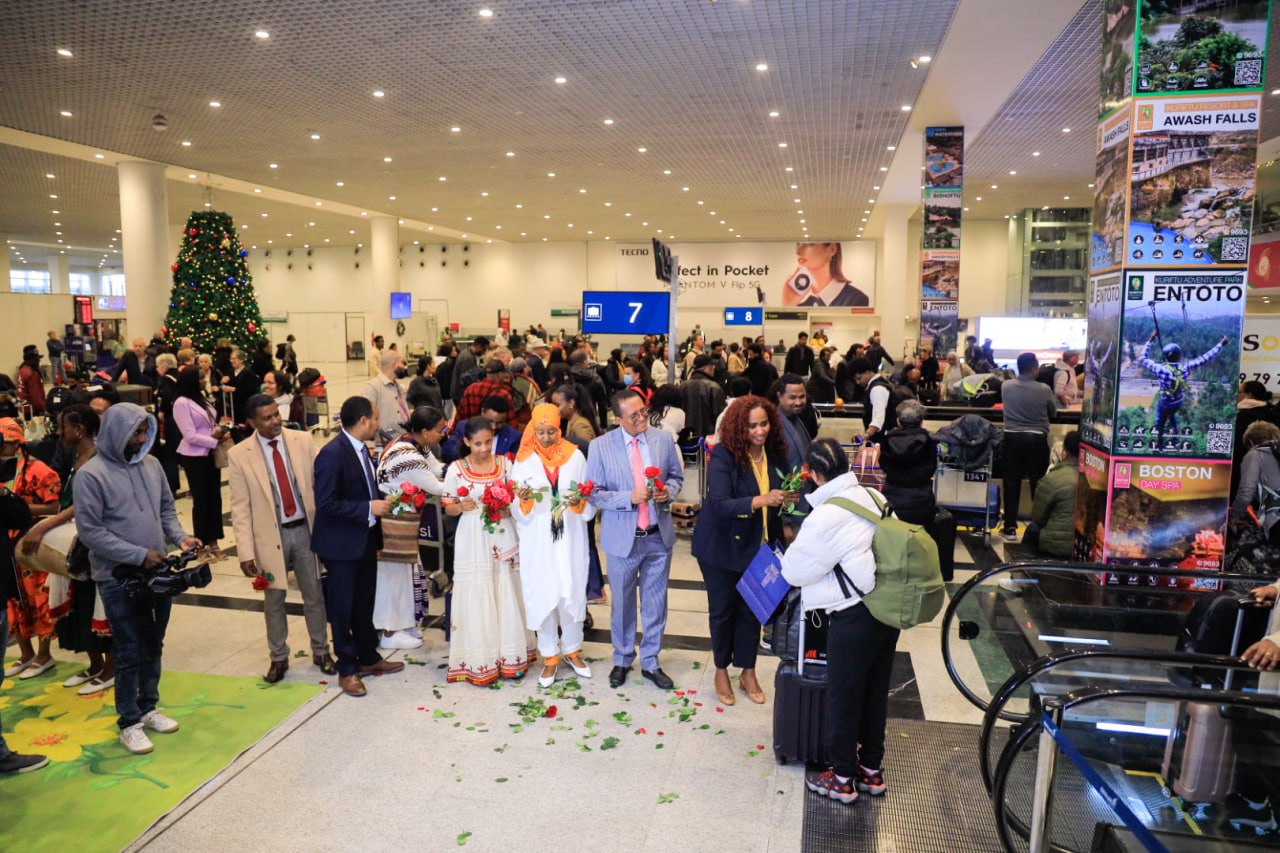Diaspora members networking at an annual get-together